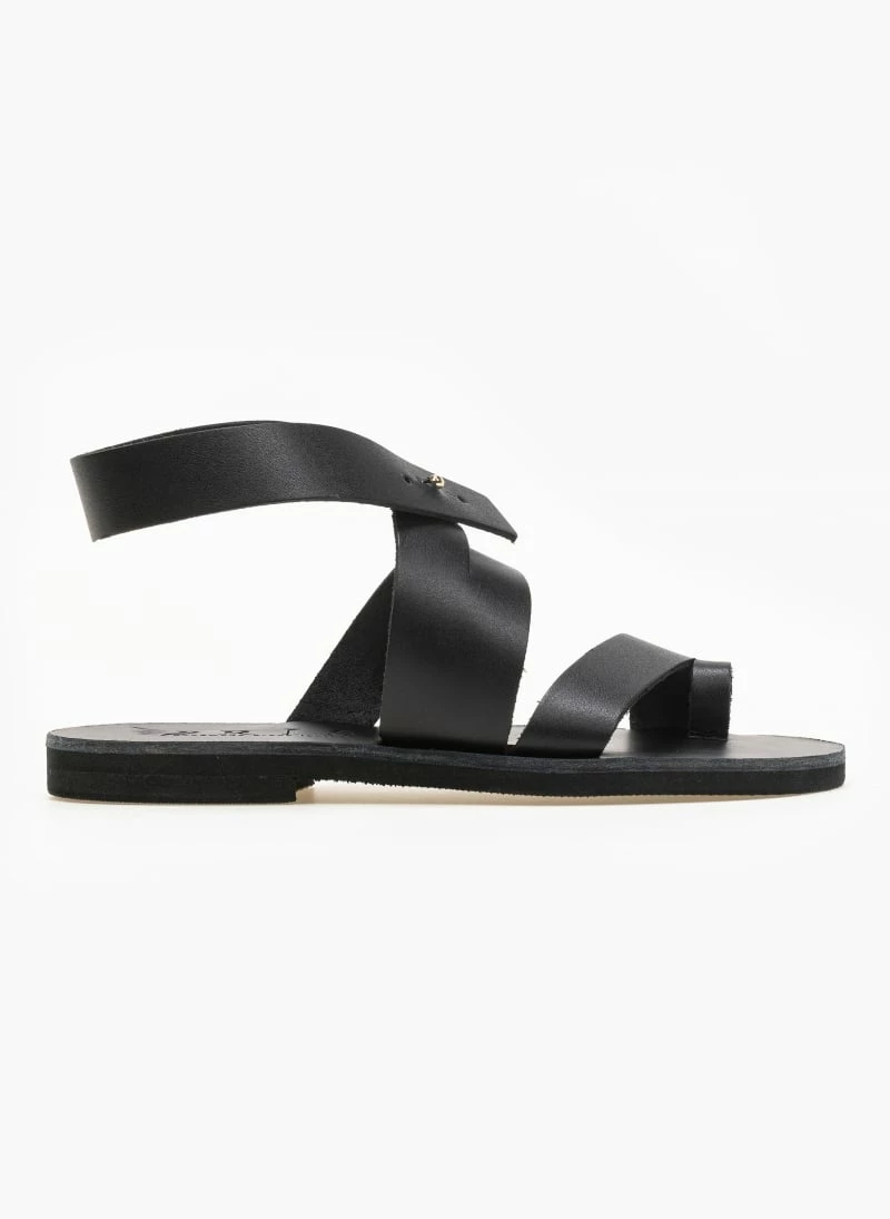 Σανδάλια δερμάτινα με ιδιαίτερο κούμπωμα Iris - Μαύρο Σανδάλια δερμάτινα με ιδιαίτερο κούμπωμα Iris - Μαύρο -The Fashion Project Κατάστημα dermatina isia pedila me idiaitero koumpwma 91018 2w57