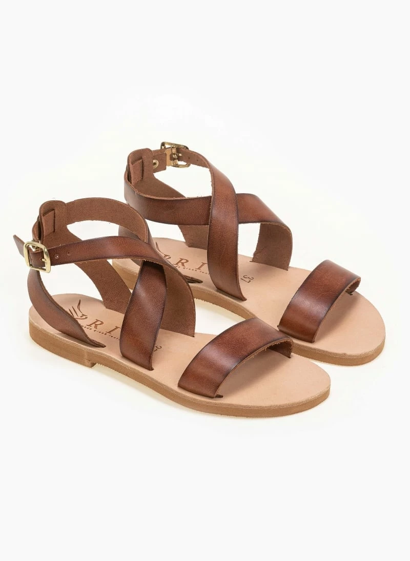 Σανδάλια δερμάτινα με crossover μπαρέτα Iris - Καφέ Σανδάλια δερμάτινα με Crossover μπαρέτα Iris - Καφέ -The Fashion Project Κατάστημα xeiropoiita dermatina isia pedila 90691 km1k